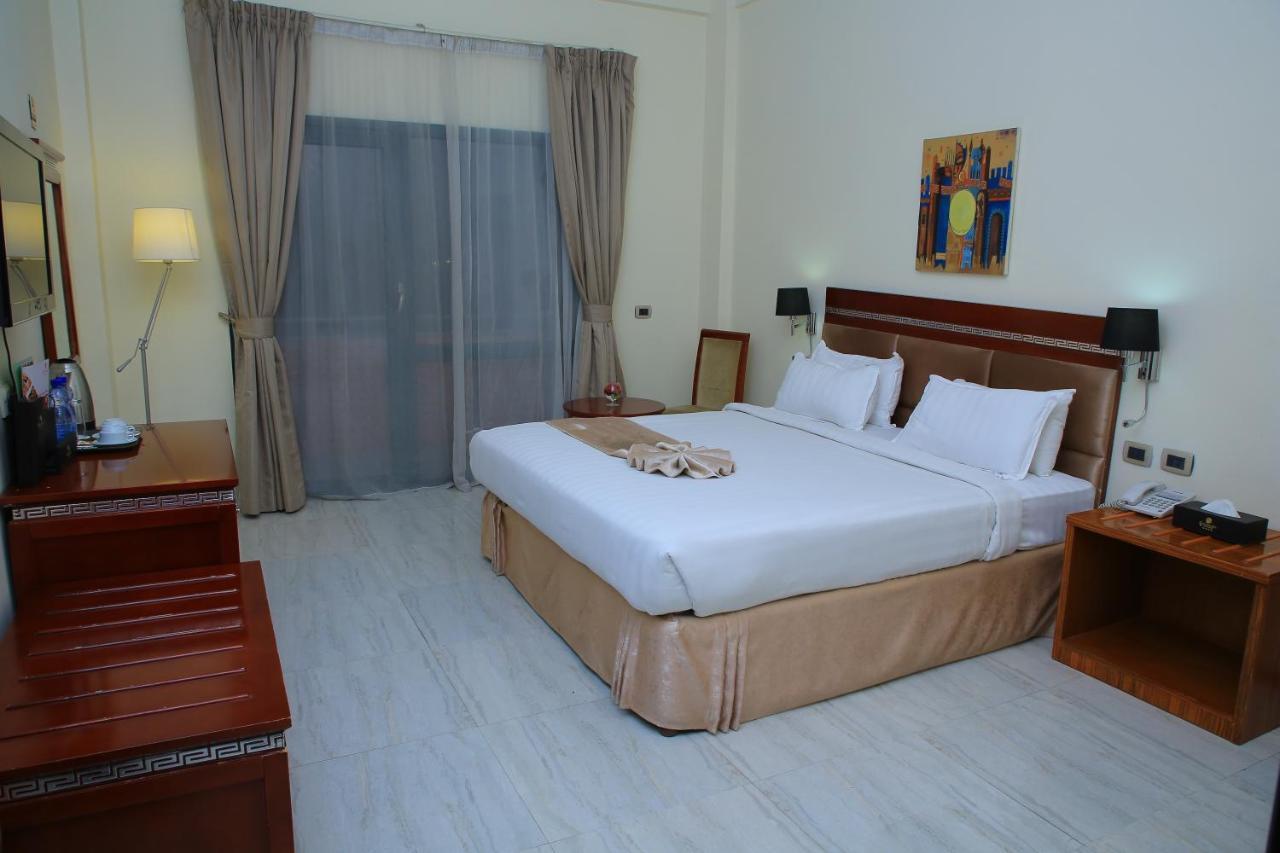 Kenenisa Hotel Аддис-Абеба Экстерьер фото