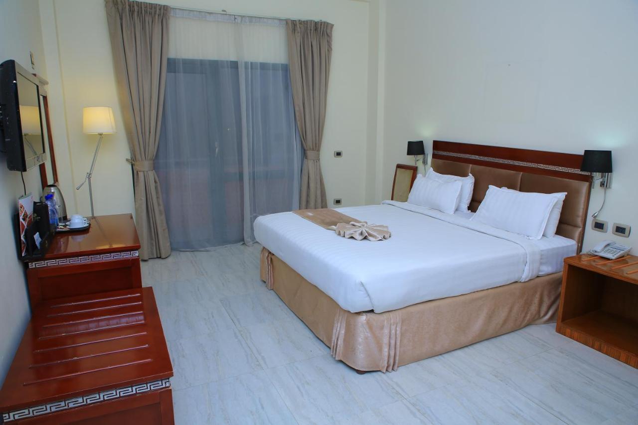 Kenenisa Hotel Аддис-Абеба Экстерьер фото