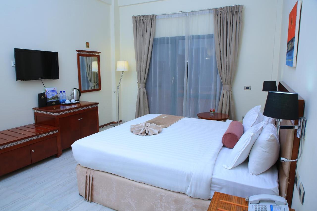 Kenenisa Hotel Аддис-Абеба Экстерьер фото